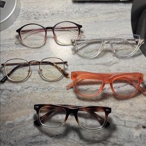 5 pairs of eye glasses